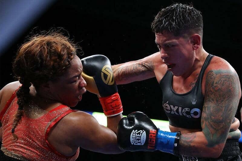 Alejandra Jimenez throws a punch at Franchon Crews-Dezurn in their WBC bout