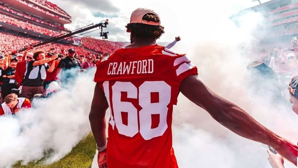 Terence Crawford leads out Nebraska Cornhuskers