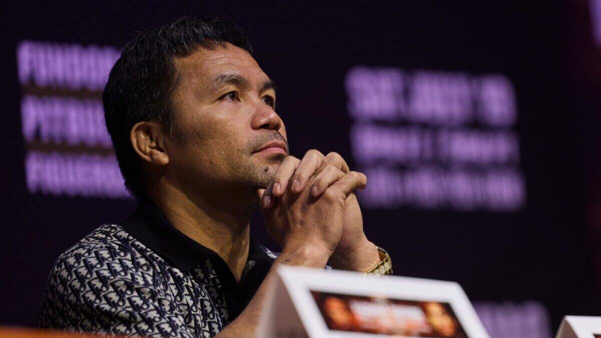 Manny Pacquiao thinking at the Barrios presser